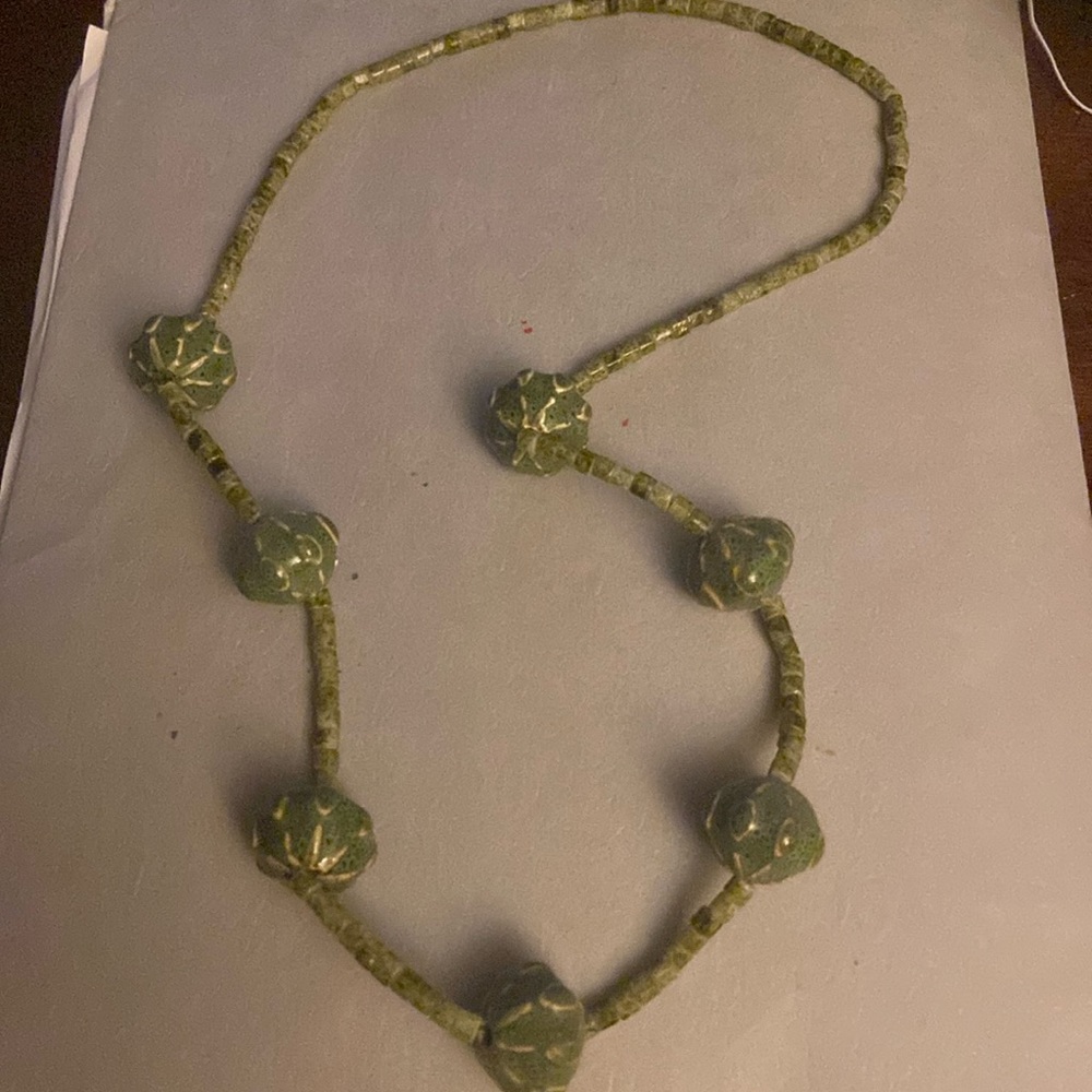 Green homemade necklace.